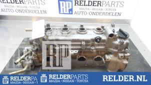Used Cylinder head Nissan Almera (N16) 1.5 16V Price € 135,00 Margin scheme offered by Relder Parts B.V.