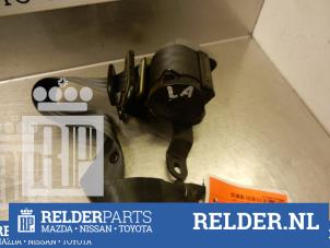 Used Rear seatbelt tensioner, left Mazda 323 C (BA13) 1.3i 16V Price € 27,00 Margin scheme offered by Relder Parts B.V.