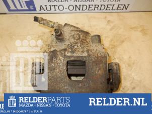 Gebrauchte Bremszange rechts vorne Mazda 121 (JA/JB) 1.25i 16V Preis € 45,00 Margenregelung angeboten von Relder Parts B.V.