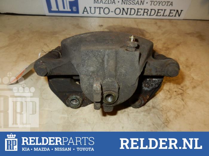 Främre bromsok, höger från en Nissan Primera (P11) 2.0 TD SLX 2001