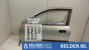 Używane Drzwi lewe wersja 2-drzwiowa Nissan Almera (N16) 1.5 16V Cena € 50,00 Procedura marży oferowane przez Relder Parts B.V.