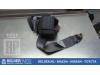 Rear seatbelt tensioner, left from a Nissan Micra (K11) 1.0 L,LX 16V 1993