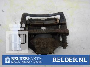 Used Front brake calliper, left Toyota Corolla (EB/ZZ/WZ/CD) 1.9 D Price € 45,00 Margin scheme offered by Relder Parts B.V.