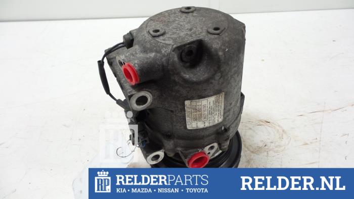 Usagé Pompe clim Nissan Primera (P11) 1.6 16V Prix € 45,00 Règlement à la marge proposé par Relder Parts B.V.