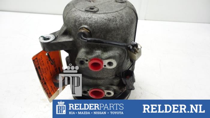 Usagé Pompe clim Nissan Primera Traveller (WP11) 2.0 TD Prix € 45,00 Règlement à la marge proposé par Relder Parts B.V.
