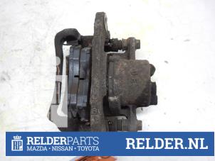 Used Front brake calliper, left Mazda 323 Fastbreak (BJ14) 1.5 LX,GLX 16V Price € 45,00 Margin scheme offered by Relder Parts B.V.