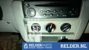 Usados Panel de control de calefacción Nissan Kubistar (F10) 1.6 16V Precio € 45,00 Norma de margen ofrecido por Relder Parts B.V.