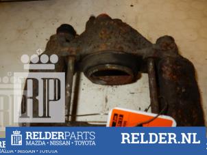Used Front brake calliper, right Mazda Demio (DW) 1.5 16V Price € 45,00 Margin scheme offered by Relder Parts B.V.