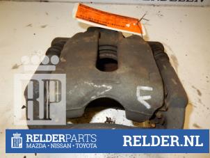 Used Front brake calliper, left Nissan Note (E11) 1.5 dCi 90 Price € 25,00 Margin scheme offered by Relder Parts B.V.