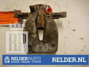 Used Rear brake calliper, right Toyota Corolla Verso (R10/11) 2.2 D-4D 16V Price € 35,00 Margin scheme offered by Relder Parts B.V.