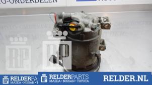 Usagé Pompe clim Nissan Almera (N16) 1.5 16V Prix € 68,00 Règlement à la marge proposé par Relder Parts B.V.