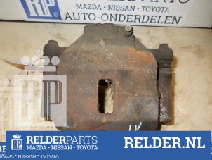 Używane Zacisk hamulcowy lewy przód Nissan Almera (N16) 2.2 Di 16V Cena € 25,00 Procedura marży oferowane przez Relder Parts B.V.