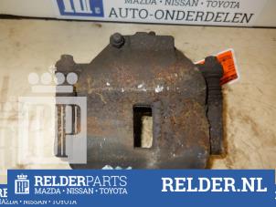 Używane Zacisk hamulcowy prawy przód Nissan Almera (N16) 1.5 16V Cena € 25,00 Procedura marży oferowane przez Relder Parts B.V.