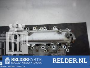 Used Cylinder head Toyota Yaris III (P13) 1.4 D-4D-F Price € 225,00 Margin scheme offered by Relder Parts B.V.
