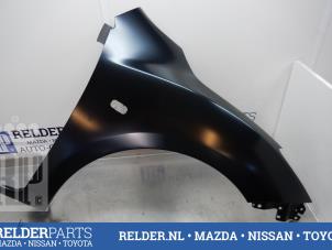 Nowe Blotnik prawy przód Mazda 3 (BL12/BLA2/BLB2) 1.6i MZR 16V Cena € 54,45 Z VAT oferowane przez Relder Parts B.V.