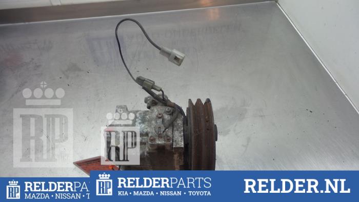 Usagé Compresseur de clim Mazda 323 (BJ12) 2.0DTiD Prix € 45,00 Règlement à la marge proposé par Relder Parts B.V.