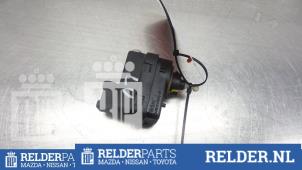 Używane Silnik reflektora Nissan Kubistar (F10) 1.6 16V Cena € 23,00 Procedura marży oferowane przez Relder Parts B.V.