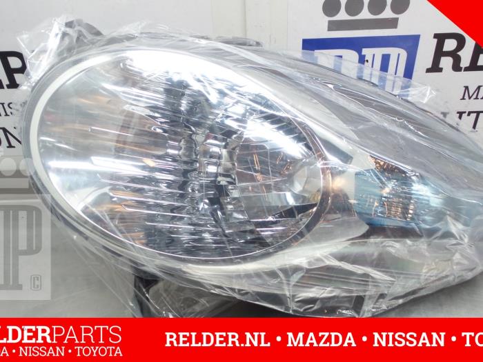 Reflektor lewy z Nissan Micra (K12) 1.6 16V 160 SR 2009