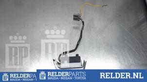 Used Steering wheel mounted radio control Nissan Note (E11) 1.6 16V Price € 32,00 Margin scheme offered by Relder Parts B.V.
