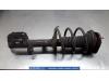 Toyota Avensis Wagon (T25/B1E) 2.0 16V D-4D Front shock absorber rod, right