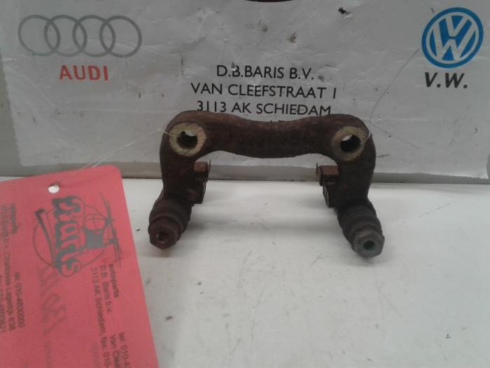 Rear brake calliperholder, left from a Audi A3 (8L1) 1.9 TDI 90 1997