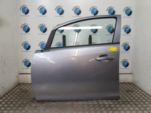 Used Door 4-door, front left Opel Corsa D Price on request offered by Rhenoy Onderdelen b.v.