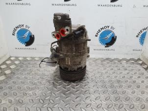 Used Air conditioning pump BMW 1 serie (E81) 118i 16V Price on request offered by Rhenoy Onderdelen b.v.