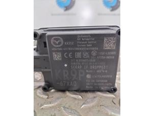 Engine management computer from a Mazda CX-80 2025
