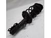 Front shock absorber, right from a Toyota Auris Touring Sports (E18), 2013 / 2018 1.8 16V Hybrid, Combi/o, Electric Petrol, 1.798cc, 100kW (136pk), FWD, 2ZRFXE, 2013-07 / 2018-12, ZWE186L-DW; ZWE186R-DW 2014