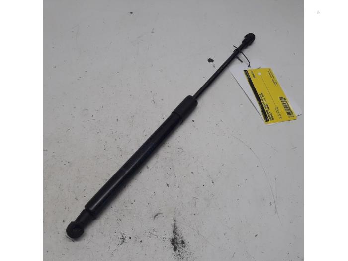 Rear gas strut, right from a Renault Twingo II (CN) 1.2 2010