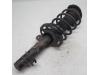 Fronts shock absorber, left from a Peugeot 208 I (CA/CC/CK/CL) 1.6 Blue HDi 2018