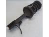 Rear shock absorber, left from a Nissan X-Trail (T30), 2001 / 2013 2.2 dCi 16V 4x4, SUV, Diesel, 2.184cc, 100kW (136pk), 4x4, YD22ETI, 2001-06 / 2008-12, ENT30 2004