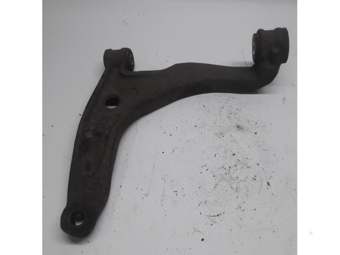 Front lower wishbone, left from a Volkswagen Transporter T5 1.9 TDi 2008