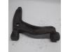 Front lower wishbone, left from a Volkswagen Transporter T5 1.9 TDi 2008