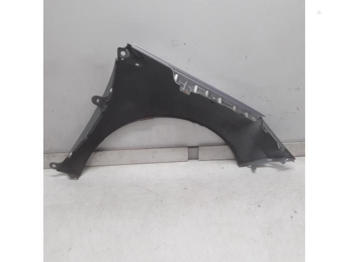 Front wing, left from a Peugeot 308 (4A/C) 1.6 VTI 16V 2008