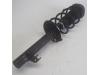 Front shock absorber, right from a Peugeot 107 1.0 12V 2010