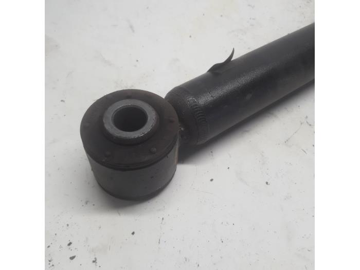 Rear shock absorber, left from a Renault Clio V (RJAB) 1.0 TCe 100 12V 2019