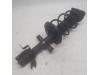 Front shock absorber, right from a Renault Clio IV Estate/Grandtour (7R) 0.9 Energy TCE 90 12V 2014