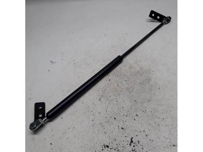 Rear gas strut, right from a Mazda 626 1998
