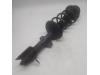Fronts shock absorber, left from a Dacia Duster (SR), 2017 / 2024 1.3 TCE 130 16V, SUV, Petrol, 1.332cc, 96kW (131pk), FWD, H5H470; H5HB4; H5H480; H5HE4, 2019-01 / 2024-03, SRDHE2MF 2019