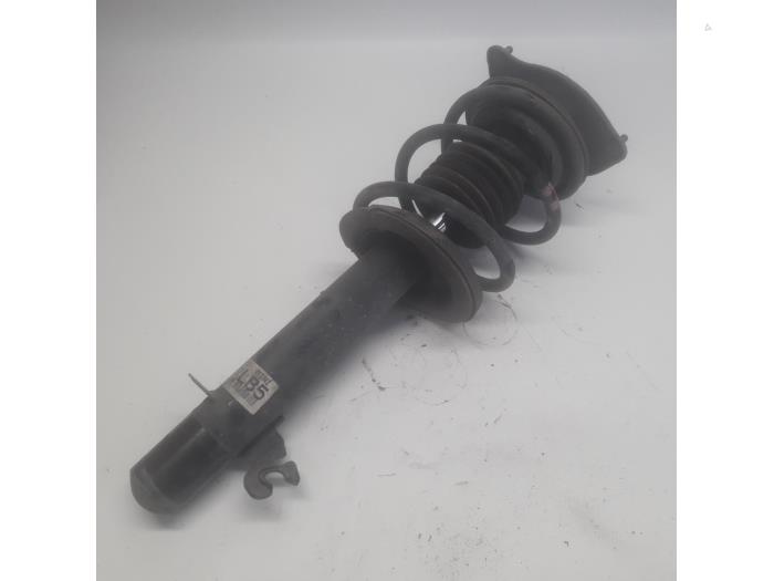 Fronts shock absorber, left from a MINI Mini One/Cooper (R50) 1.6 16V One 2005