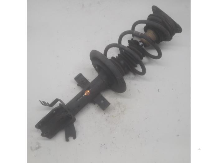 Front shock absorber, right from a Renault Clio IV Estate/Grandtour (7R) 1.5 Energy dCi 90 FAP 2014