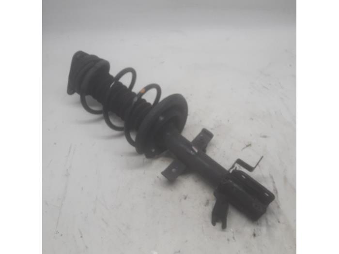 Fronts shock absorber, left from a Renault Clio IV (5R) 0.9 Energy TCE 90 12V 2017