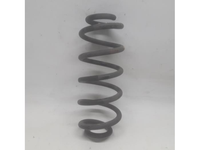 Rear coil spring from a Renault Twingo III (AH) 1.0 SCe 70 12V 2015