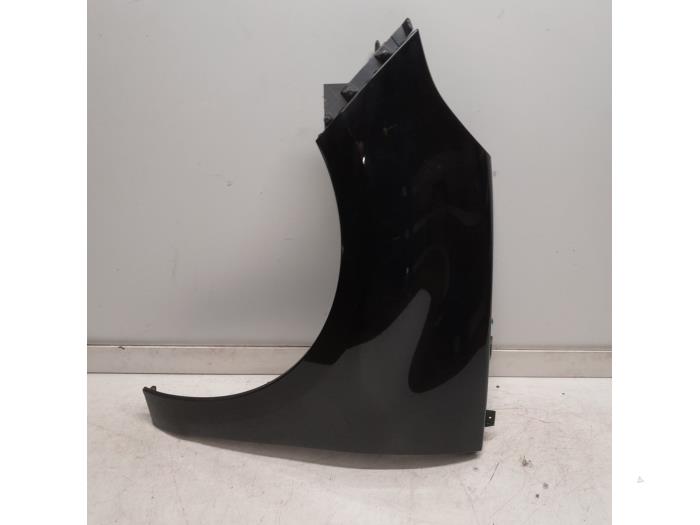 Front wing, left from a Renault Scénic III (JZ) 1.6 16V 2011