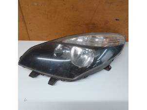 Used Headlight, left Renault Scénic III (JZ) 1.6 16V Price € 157,50 Margin scheme offered by Reclycar De Boer BV