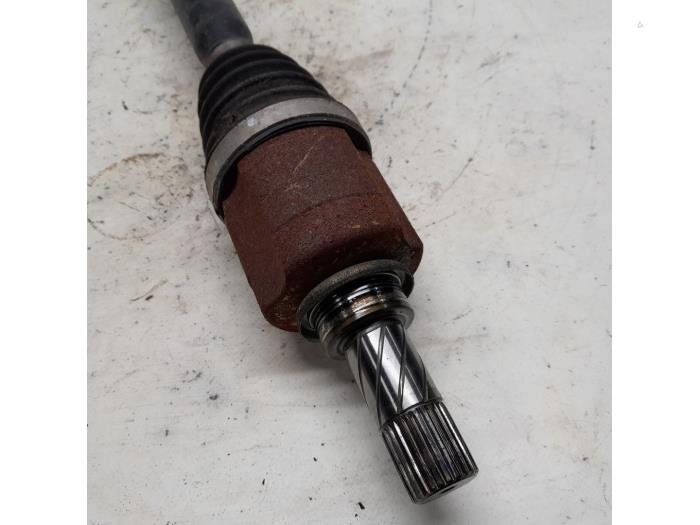 Front drive shaft, left from a Renault Laguna III Estate (KT) 1.5 dCi 110 FAP 2011