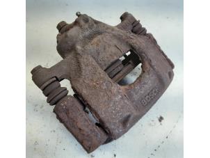 Used Front brake calliper, left Citroen C1 1.0 12V Price € 15,75 Margin scheme offered by Reclycar De Boer BV
