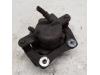 Front brake calliper, left from a Dacia Duster (HS) 1.6 SCe 115 16V 2016