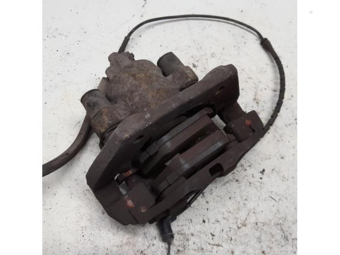 Rear brake calliper, right from a BMW X5 (E53) 3.0d 24V 2005